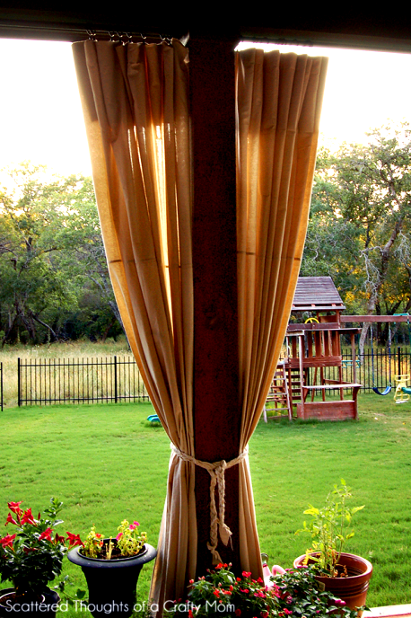 Outdoor project - add no-sew drop cloth curtains to a covered patio, from Scattered Thoughts of a Crafty Mom