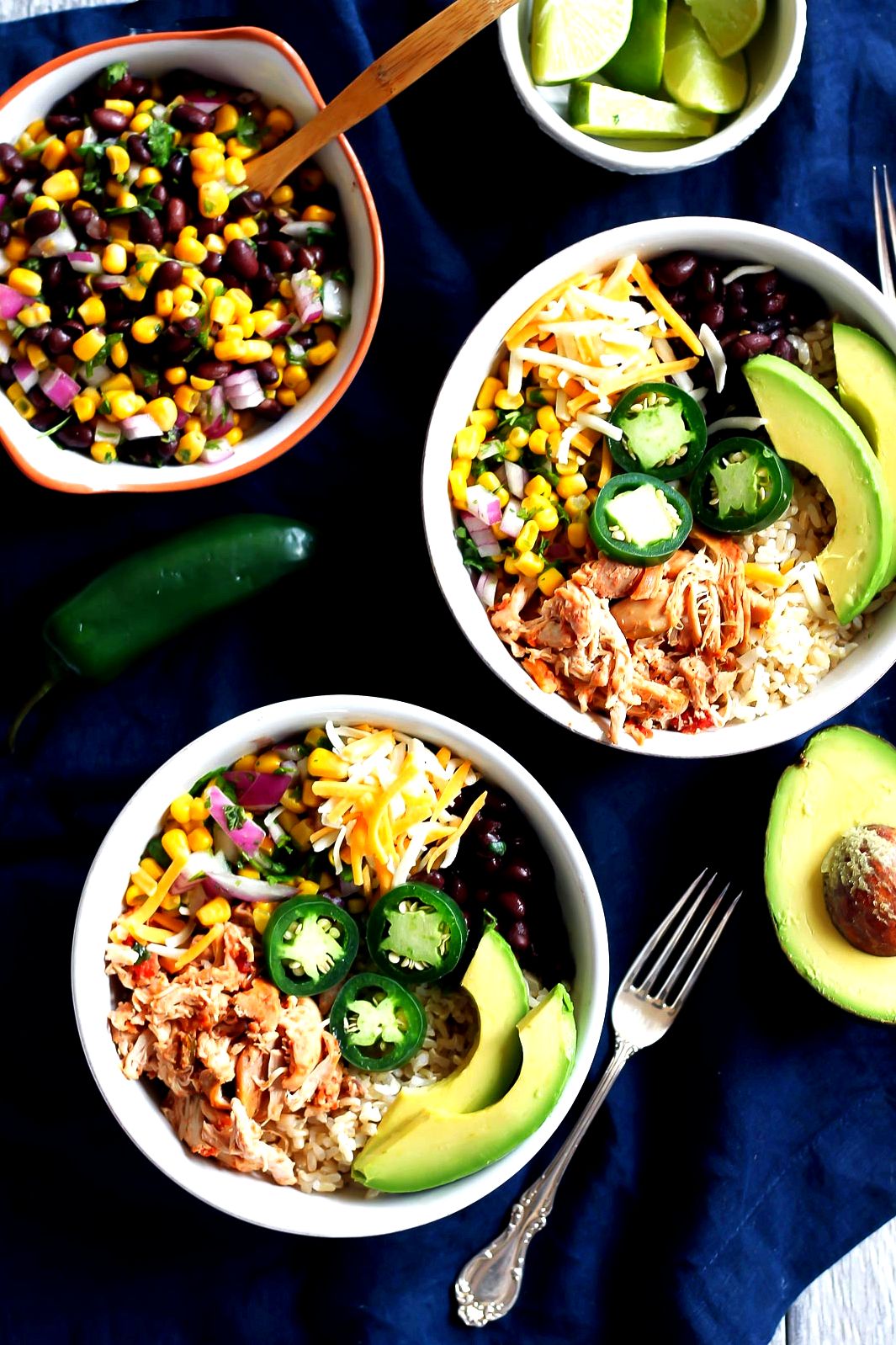 Better than Chipotle DIY Chicken Burrito Bowls that are awesome for clean eating and healthy meal prep. Cheap & easy to make. Chicken can be made in the slow cooker too!