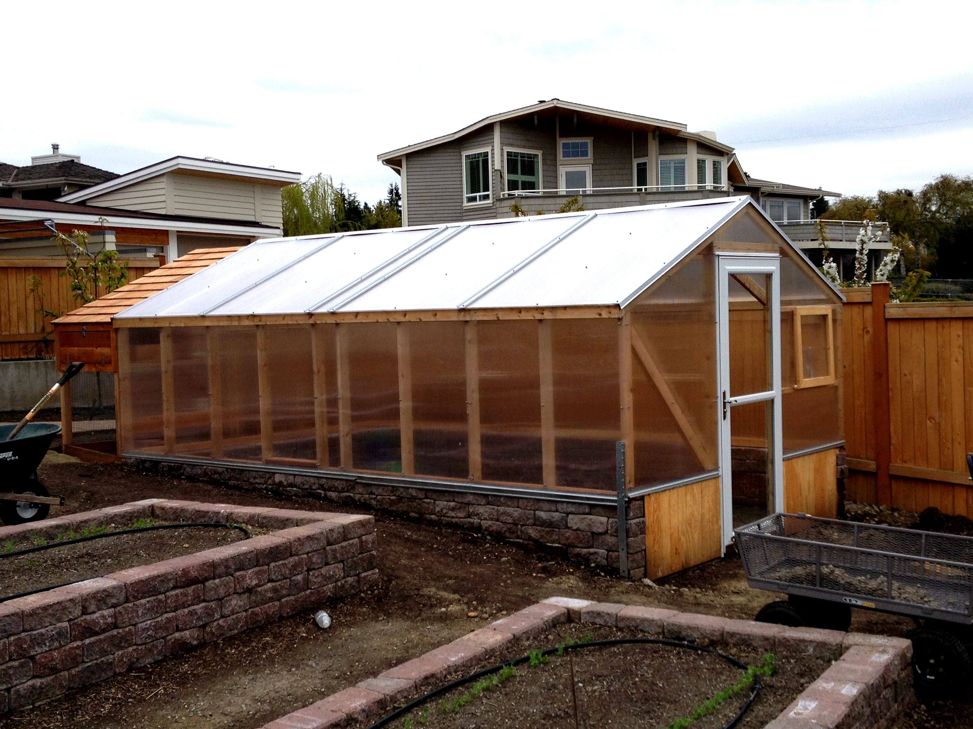 Chicken house and green house construction discourage burrowing predators from